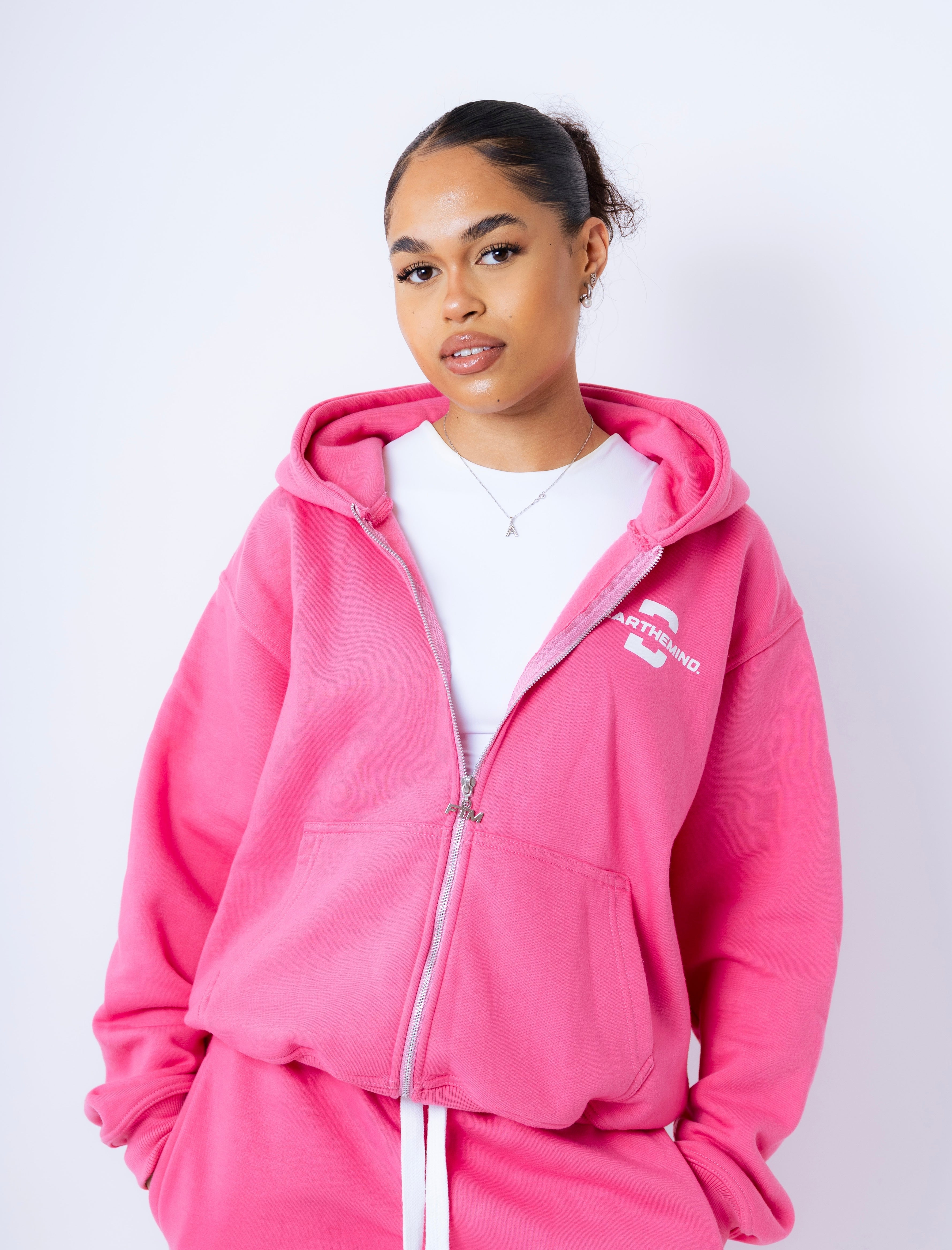 model, 5 ft 7 in, wearing a medium hoodie