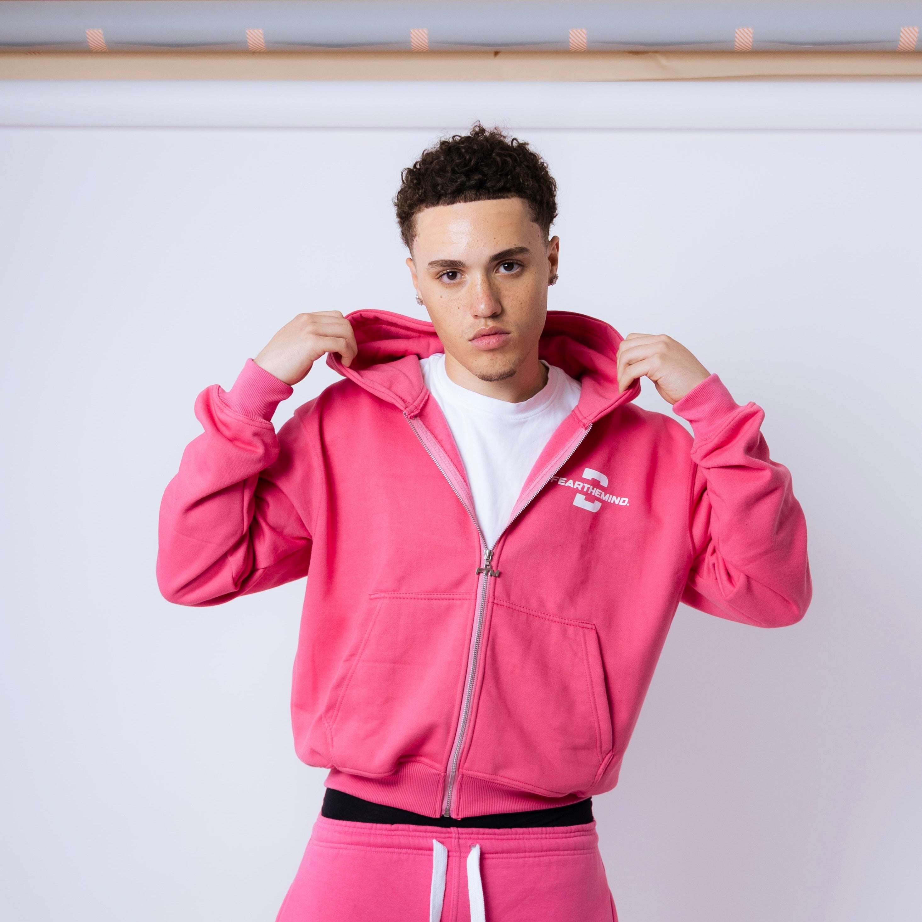 model, 6ft 1in, wearing a medium hoodie