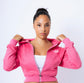 The model, 5 ft 4, wearing a small cropped hoodie. 