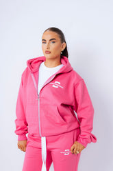Model, 5 ft 4, wearing a medium hoodie