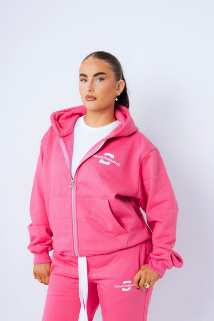 Model, 5 ft 4, wearing a medium hoodie
