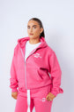 Model, 5 ft 4, wearing a medium hoodie